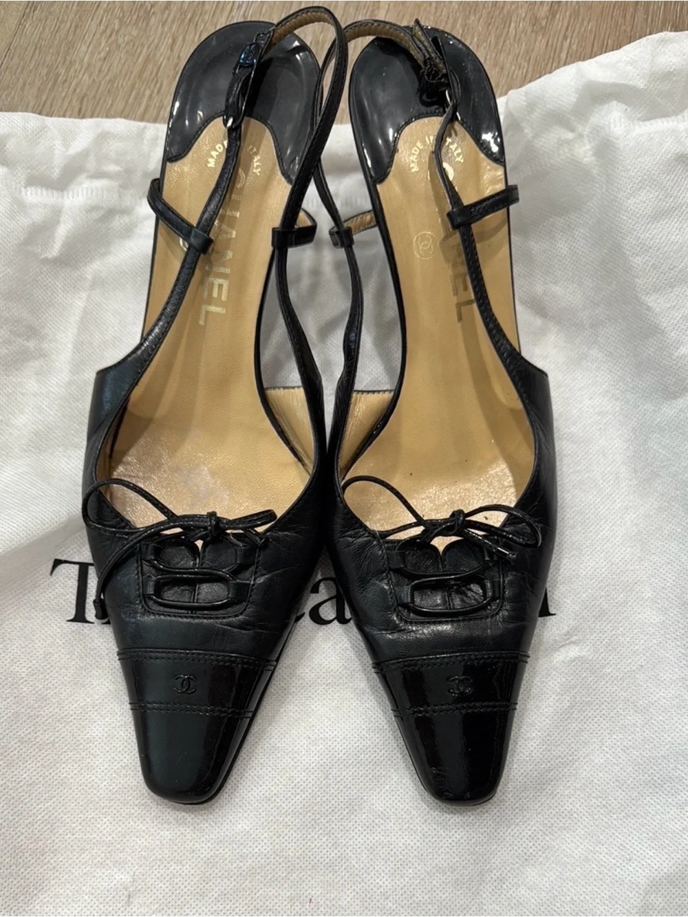 CHANEL Black Leather Pointed Slingback Heels with Bow Detail